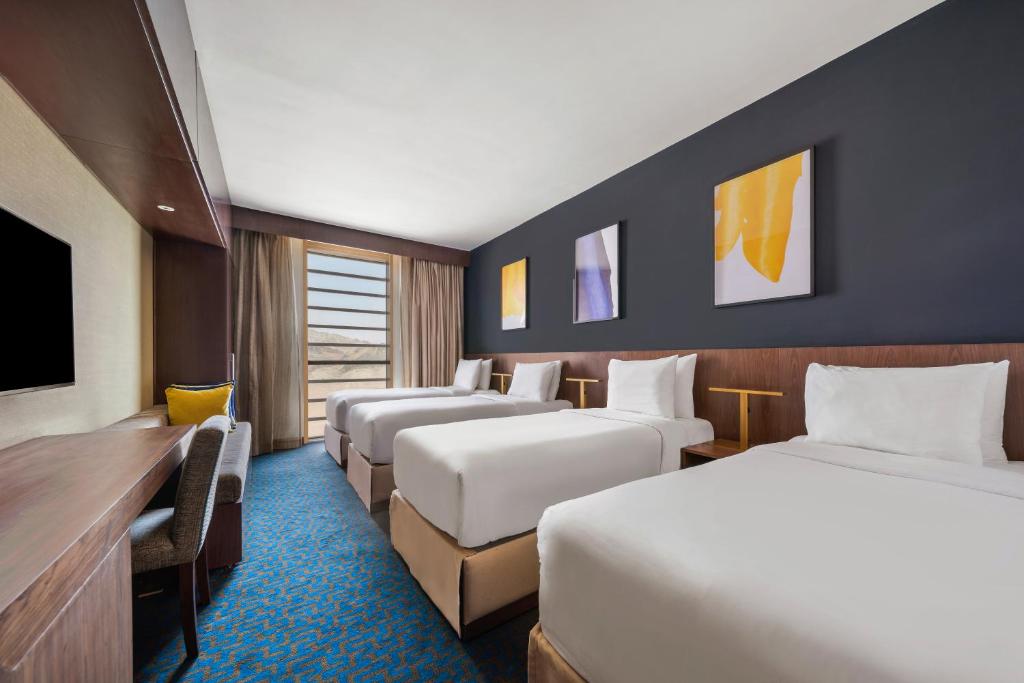 Deluxe Quad Room